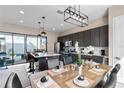 Spacious kitchen with stainless steel appliances and island at 153 Villa Domani Cir, Davenport, FL 33896