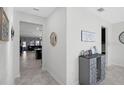 Bright entryway with view into spacious living area at 2089 Camden Loop, Davenport, FL 33837