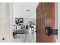 View of living room and dining area from entry at 625 Greencove Ter # 123, Altamonte Springs, FL 32714
