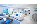 Bright living room with open layout and kitchen views at 110 Rosedale Dr, Deltona, FL 32738