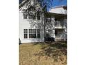 Condominium building exterior with multiple windows and outdoor balcony at 11574 Westwood Blvd # 1122, Orlando, FL 32821