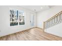 Bright entryway with wood floors and view to courtyard at 2225 Valentine Aly, Orlando, FL 32804