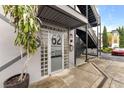 Building entrance at 62 W. Colonial Drive featuring China Glass Warehouse door and outdoor stairs at 62 W Colonial Dr # 302, Orlando, FL 32801
