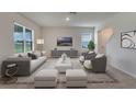 Bright living room with comfortable seating and a modern feel at 4601 Boxwood Way, Mount Dora, FL 32757