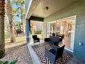 Cozy outdoor patio with stylish furniture, providing a relaxing extension of the living space at 10421 Manderley Way # 268, Orlando, FL 32829