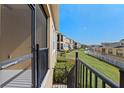 View from the balcony overlooking the community at 17438 Promenade Dr, Clermont, FL 34711