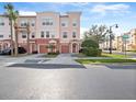 Three-story townhome with two-car garage and curb appeal at 8013 Cool Breeze Dr # 116, Orlando, FL 32819