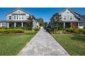 Townhouses with manicured lawns and landscaped pathway at 1217 E Muriel St, Orlando, FL 32806