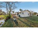 Backyard with a deck overlooking a pond at 124 Loon Ct, Daytona Beach, FL 32119