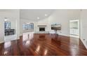 Spacious living room with hardwood floors and fireplace at 124 Loon Ct, Daytona Beach, FL 32119