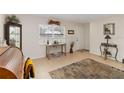 Bright entryway featuring a large window, tile flooring, and neutral wall color at 5326 Metro Dr, Orlando, FL 32818