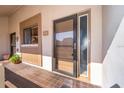 Condo front entrance features a bronze security door and adjacent view window for a bright entry at 262 Orienta Point St # 1, Altamonte Springs, FL 32701