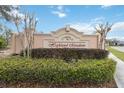 Highland Meadows community sign surrounded by well-maintained landscaping and greenery at 330 Pheasant Dr, Haines City, FL 33844