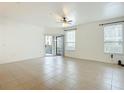 Bright living room with access to a balcony at 2015 Erving Cir # 106, Ocoee, FL 34761