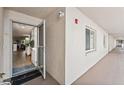 Bright condo entrance with tiled floors, and a view into the living area at 1150 Carmel Cir # 503, Casselberry, FL 32707