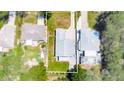 Birds eye view of home showing the location, yard size, and privacy fence at 2243 Davis Dr, New Smyrna Beach, FL 32168