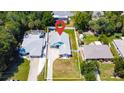 Aerial view of the home, showing the spacious backyard, privacy fence, and location of the property at 2243 Davis Dr, New Smyrna Beach, FL 32168