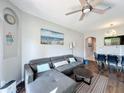 Comfortable living room featuring a plush sectional sofa and stylish decor at 569 La Mirage St, Davenport, FL 33897