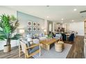 Bright living room featuring modern decor connected to the dining area at 2563 Kinsale Ln, Ormond Beach, FL 32174