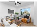 Contemporary living room featuring stylish furniture, a ceiling fan, and plenty of natural light at 311 Sandlewood Trl # 4, Winter Park, FL 32789