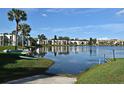 Waterfront view with lake access and boat storage featuring nearby condominiums at 536 Orange Dr # 16, Altamonte Springs, FL 32701