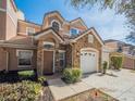 Lovely home with a beautiful stone facade, complemented by manicured landscaping and a two-car garage at 7532 Bay Port Rd # 18, Orlando, FL 32819