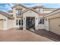 Elegant entryway featuring a stylish front door and stone accents at 1191 Terralago Way, Kissimmee, FL 34746