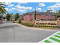 Hanover Pointe gated community entrance featuring brick signage at 1558 Downy Birch Ln, Longwood, FL 32750