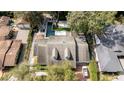 Aerial view of a home featuring a long rectangular pool and mature landscaping at 181 N Phelps Ave, Winter Park, FL 32789