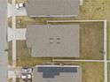 Overhead view of home showing roof and proximity to neighbors at 5861 Bar Ranch Rd, St Cloud, FL 34771