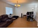 Inviting living room with an open floor plan and lots of natural light at 125 Water Front Way # 200, Altamonte Springs, FL 32701