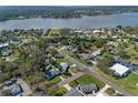 Scenic aerial view of the neighborhood with lake access and lush greenery at 1300 Conrad Dr, New Smyrna Beach, FL 32168