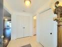 Bright foyer with tile flooring, double door closet, and access to other rooms in the unit at 4304 Clubside Dr # 4304, Longwood, FL 32779