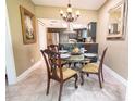 Inviting dining area with elegant décor and stylish furnishings, conveniently located near the kitchen at 5016 Fawn Ridge Rd, Orlando, FL 32819