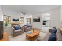 Cozy living room featuring neutral tones, comfortable seating, and natural light at 923 Lexington Pkwy # 14, Apopka, FL 32712