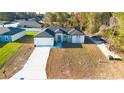 Inviting single-story home with a two-car garage and well-manicured lawn and landscape at 2629 Sw 163Rd Pl, Ocala, FL 34473