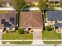A clean aerial view of a single Gathering home in a manicured lawn community at 4605 Kalispell Rd, Kissimmee, FL 34758