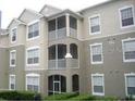 Condo building with multiple screened balconies offers a blend of indoor-outdoor living at 586 Brantley Terrace Way # 201, Altamonte Springs, FL 32714