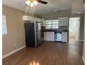 Modern kitchen features stainless steel appliances and ample cabinet space at 905 Governors Ave, Orlando, FL 32808