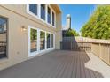 Spacious back deck of a home, perfect for outdoor enjoyment and entertaining at 229 Springside Rd, Longwood, FL 32779