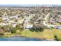 Aerial view of the neighborhood with waterfront properties and mature tree coverage at 250 Domino Dr, Orlando, FL 32805