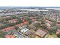 This aerial shows the property's neighborhood and how close it is to the city at 7709 Sundial Ln, Orlando, FL 32819