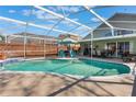 Enjoy the sun in this beautiful screened in pool, with a fenced yard for privacy at 13209 Wild Duck Ct, Orlando, FL 32828