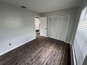 Comfortable bedroom with updated flooring and large closet at 1542 Colony Ave, Kissimmee, FL 34744