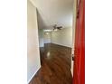 Home's entryway featuring hardwood floors and neutral paint at 3008 Parkway Blvd # 302, Kissimmee, FL 34747