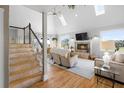 Spacious living area with fireplace and staircase that offers great natural lighting at 2045 Green Cedar Ln, Geneva, FL 32732