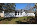 Exterior front view of home featuring freshly painted exterior at 50 Avalon Ct, Casselberry, FL 32707