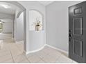 Welcoming entryway with tile flooring and neutral decor at 1218 Falling Star Ln, Orlando, FL 32828