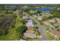 Beautiful aerial view of a residential community with access to lakes and green spaces at 21636 King Henry Ave, Leesburg, FL 34748