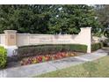 The Vistas at Phillips Commons community sign with manicured landscaping creates a welcoming entrance at 6855 Sperone St, Orlando, FL 32819